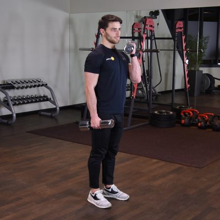 Naprzemienne uginanie ramion z rotacją z hantlami Naprzemienne uginanie ramion z rotacją z hantlami