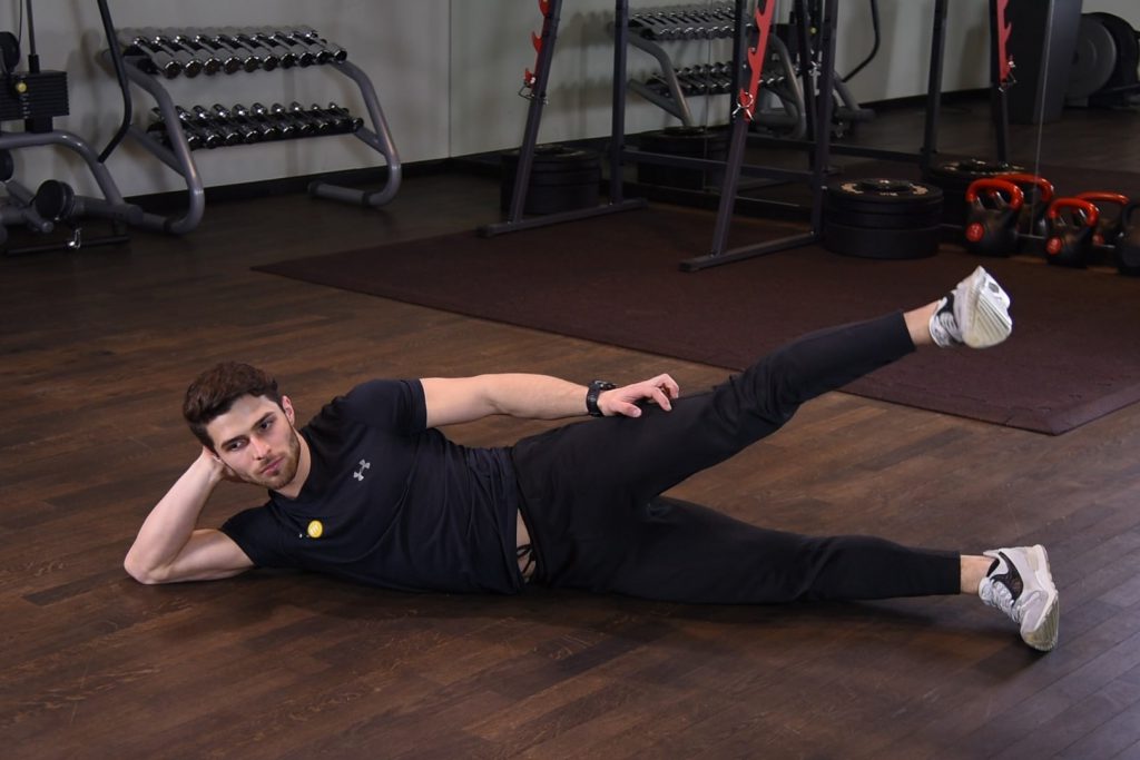 Odwodzenie nogi w leżeniu bokiem Odwodzenie nogi w leżeniu bokiem