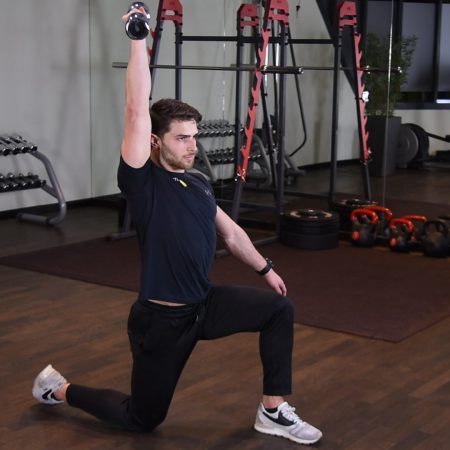 Wyciskanie hantla nad głowę w klęku jednonóż Wyciskanie hantla nad głowę w klęku jednonóż
