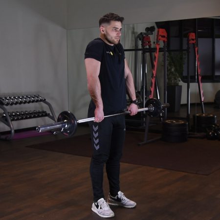 Szrugsy ze sztangą Ćwiczenie Szrugsy ze sztangą - just be fit