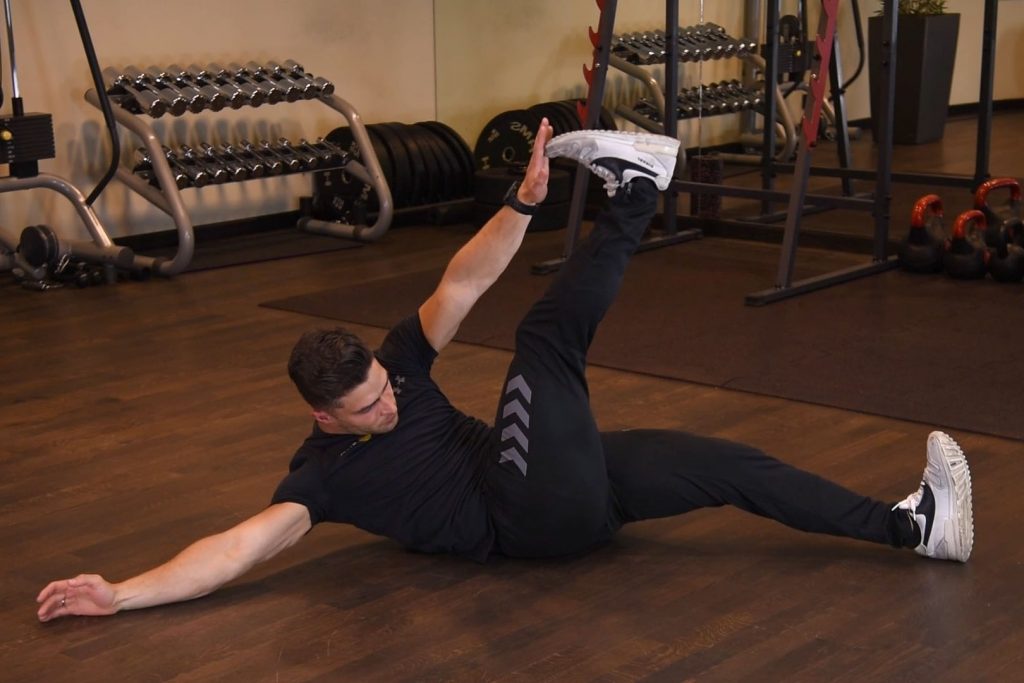 Cross toe touch Cross toe touch - just be fit