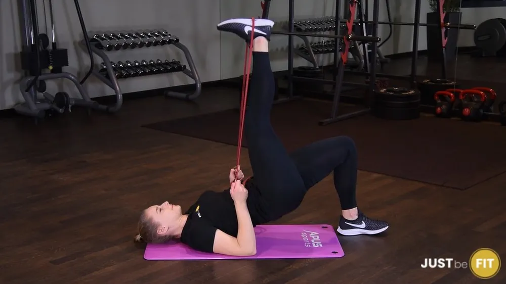 ćwiczenia na pośladki wznosy bioder jednonóż z gumą power band