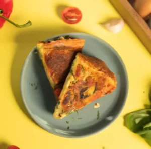 Omlet z suszonymi pomidorami, pieczarkami i bazylią