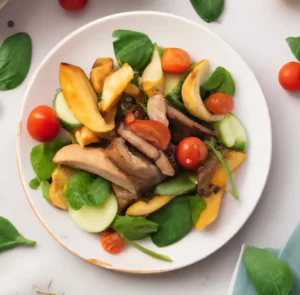 Sałatka z rostbefem, pieczonymi ziemniakami i pomidorkami cherry