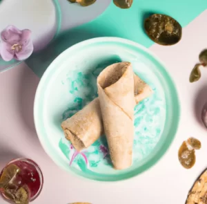 Pełnoziarniste naleśniki z waniliowym twarożkiem, dżemem i bananem