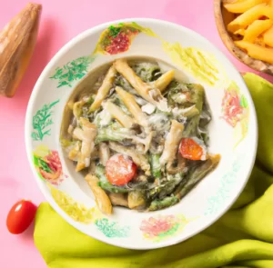 Makaron penne z pieczarkami i szpinakiem w sosie śmietanowym